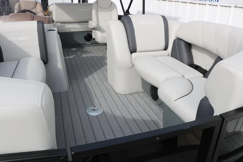 Slide: The Image of 2025 Sylvan MIRAGE 822 CLZ DH boat interior with luxurious seating and modern design. - 9
