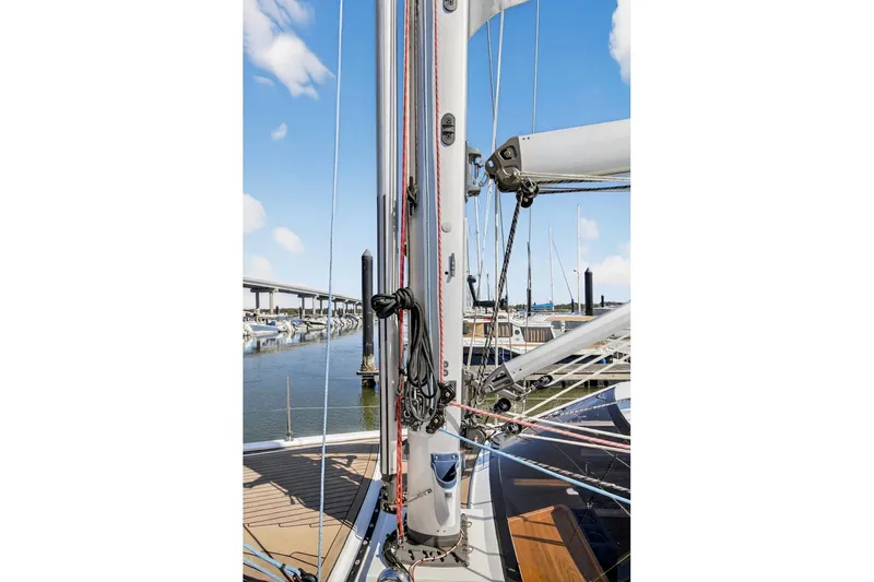 Slide: The Image of 2024 Southerly 420 sailboat mast and rigging at marina, clear blue sky. - 13