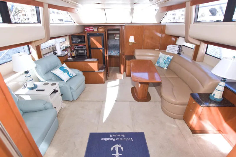 Slide: The Image of Luxurious interior of 2007 Meridian 459 Motoryacht with plush seating and elegant decor. - 40