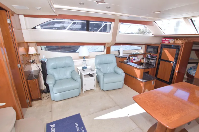 Slide: The Image of Luxurious interior of 2007 Meridian 459 Motoryacht with plush seating and modern amenities. - 43