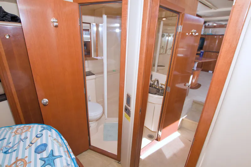 Slide: The Image of Interior of 2007 Meridian 459 Motoryacht featuring bathroom and cabin area. - 54