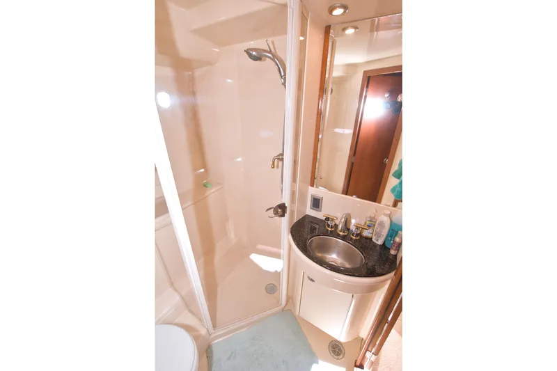 Slide: The Image of Bathroom of 2007 Meridian 459 Motoryacht with shower, sink, and toiletries. - 56