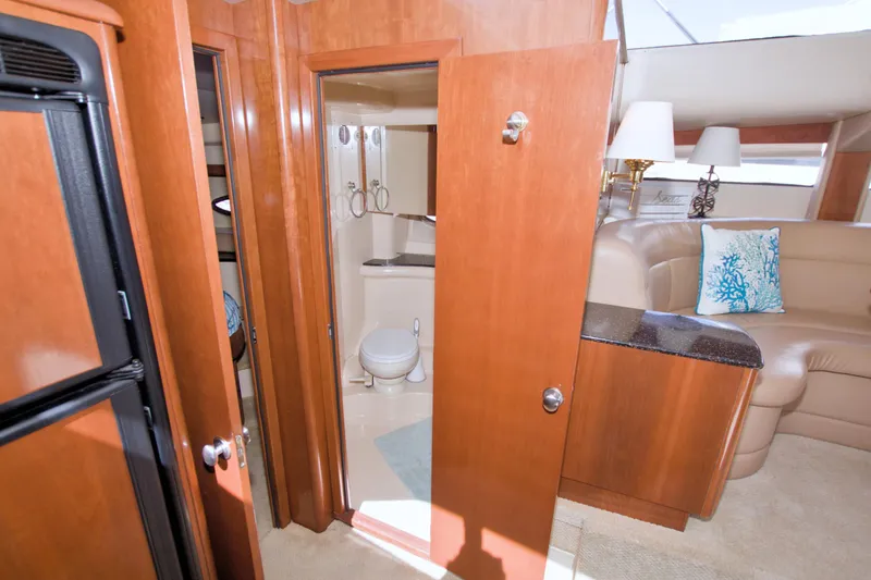 Slide: The Image of Interior of 2007 Meridian 459 Motoryacht with bathroom and seating area. - 57