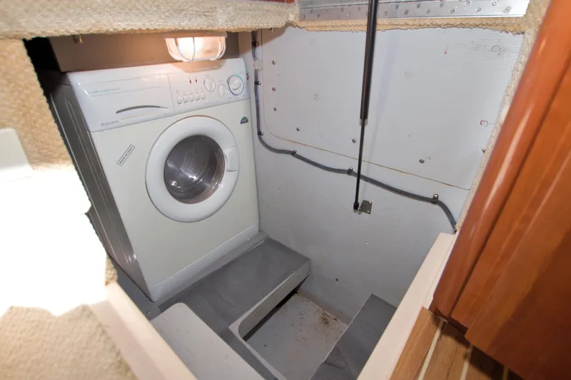 Slide: The Image of Laundry area with washing machine in 2007 Meridian 459 Motoryacht. - 59