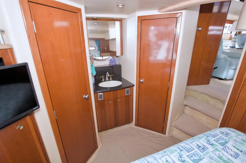 Slide: The Image of Interior of 2007 Meridian 459 Motoryacht with wood cabinetry and compact sink area. - 67