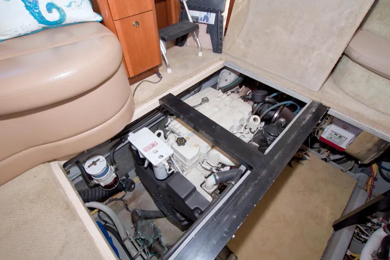 Slide: The Image of Engine compartment of 2007 Meridian 459 Motoryacht, showcasing mechanical components and interior layout. - 73