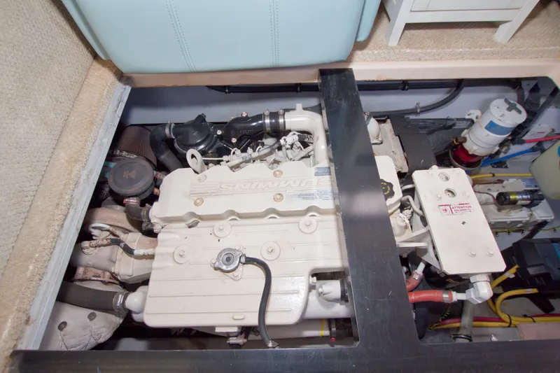 Slide: The Image of Engine compartment of a 2007 Meridian 459 Motoryacht, showcasing detailed mechanical components. - 76