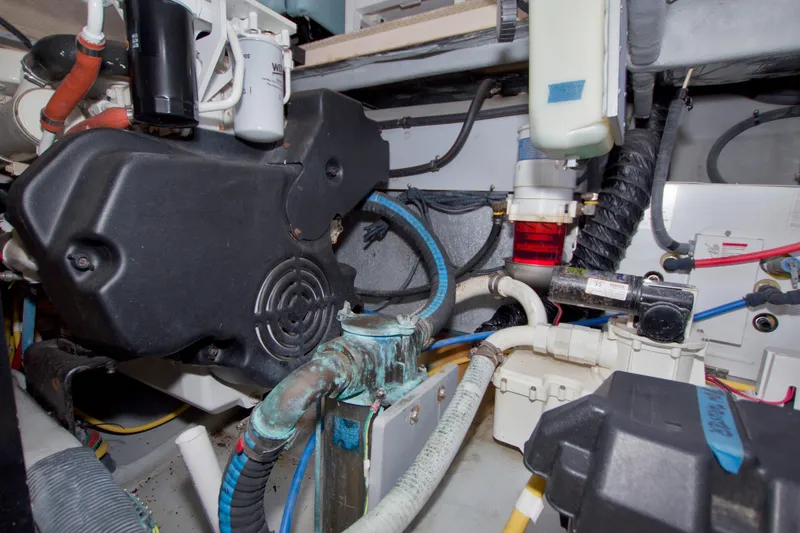 Slide: The Image of Engine room of 2007 Meridian 459 Motoryacht with various mechanical components. - 77