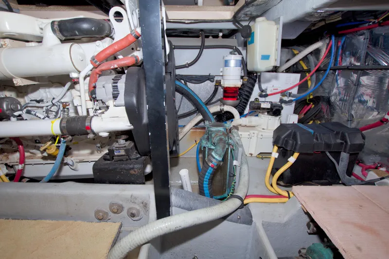 Slide: The Image of Engine room of a 2007 Meridian 459 Motoryacht with visible wiring and components. - 78