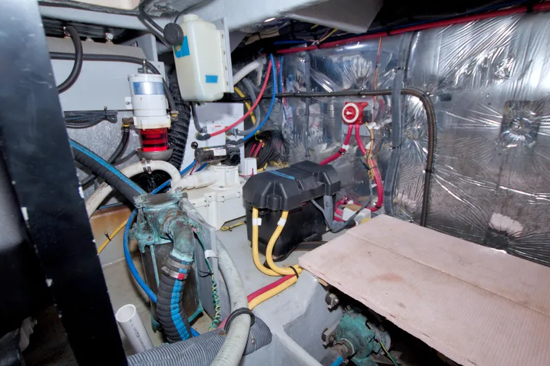 Slide: The Image of Engine room of 2007 Meridian 459 Motoryacht with wiring and mechanical components. - 79
