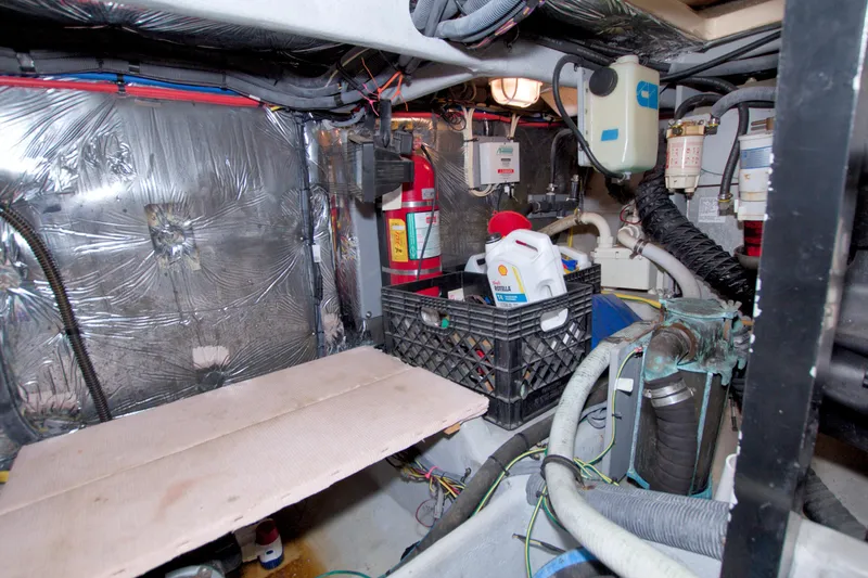 Slide: The Image of Engine room of 2007 Meridian 459 Motoryacht with equipment and maintenance supplies. - 81