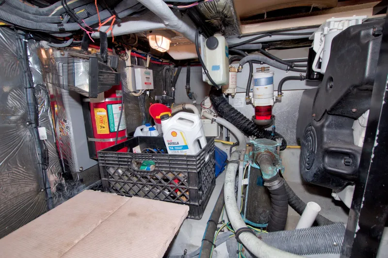 Slide: The Image of Engine room of 2007 Meridian 459 Motoryacht with maintenance supplies and equipment. - 82