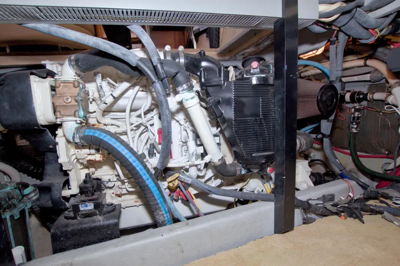 Slide: The Image of Engine room of 2007 Meridian 459 Motoryacht, showcasing complex machinery and wiring. - 86
