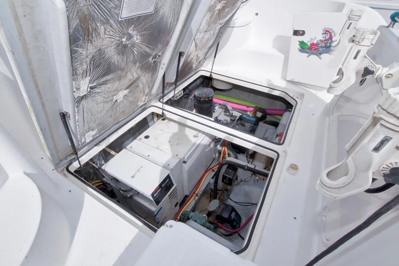 Slide: The Image of Engine compartment of 2007 Meridian 459 Motoryacht, showcasing mechanical components and wiring. - 92
