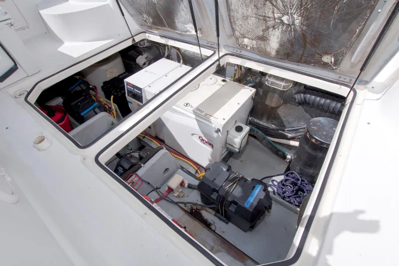 Slide: The Image of Engine compartment of 2007 Meridian 459 Motoryacht, showcasing equipment and wiring. - 94