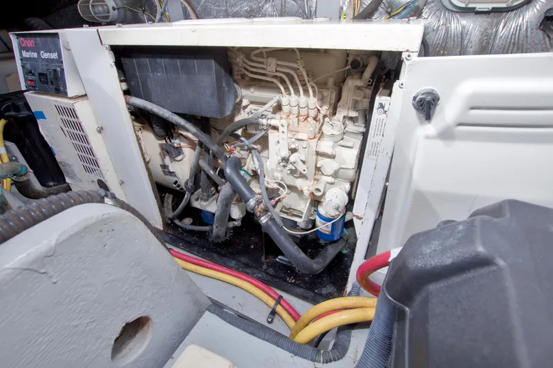 Slide: The Image of Engine room of 2007 Meridian 459 Motoryacht with Onan Marine Genset. - 95