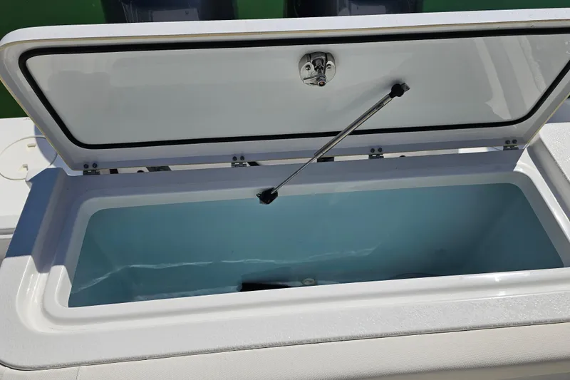 Slide: The Image of Open storage compartment on 2021 Sea Hunt Gamefish 27 Forward Seating boat. - 20