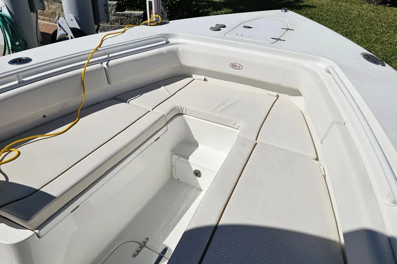 Slide: The Image of 2021 Sea Hunt Gamefish 27 Forward Seating, showcasing spacious white seating area. - 22