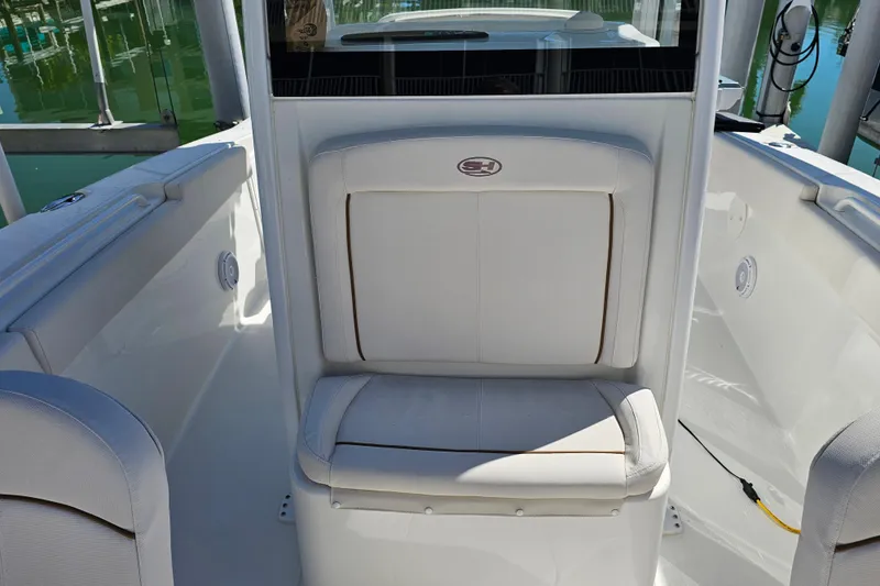 Slide: The Image of 2021 Sea Hunt Gamefish 27 Forward Seating, white interior, boat seating area. - 25