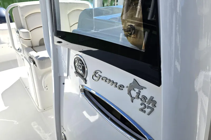Slide: The Image of 2021 Sea Hunt Gamefish 27 Forward Seating boat interior with logo detail. - 28