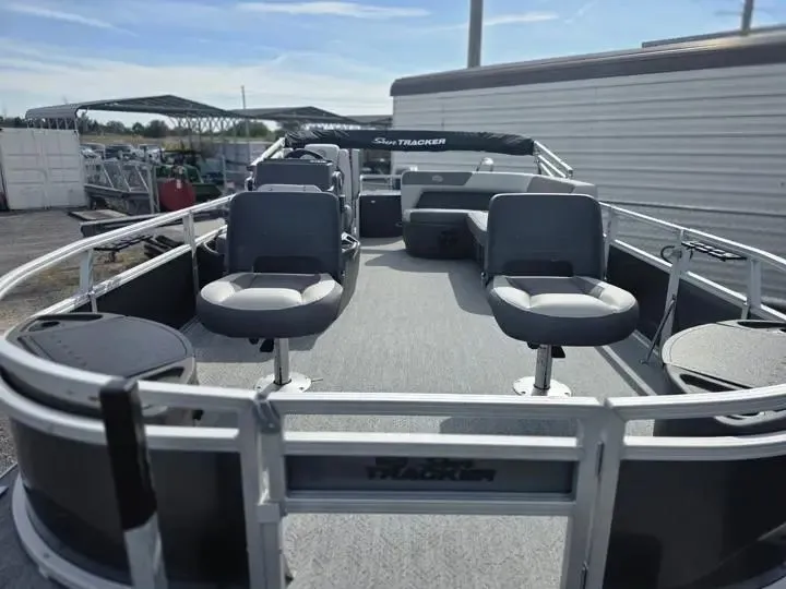Slide: The Image of 2026 Sun Tracker Bass Buggy 18 DLX pontoon boat with seating. - 10