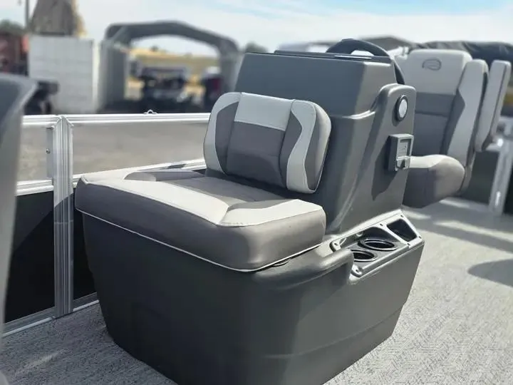 Slide: The Image of 2026 Sun Tracker Bass Buggy 18 DLX seat with cup holders. - 13