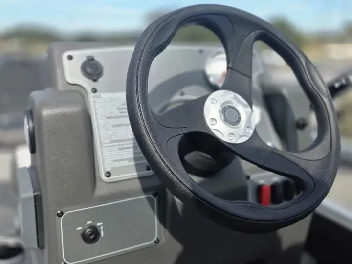 Slide: The Image of Steering wheel of Sun Tracker Bass Buggy 18 DLX 2026. - 18