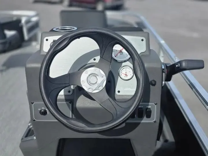 Slide: The Image of Steering wheel of Sun Tracker Bass Buggy 18 DLX 2026. - 19