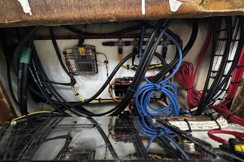 Slide: The Image of Wiring and components inside a 2001 Glacier Bay 260 Canyon Runner boat. - 40