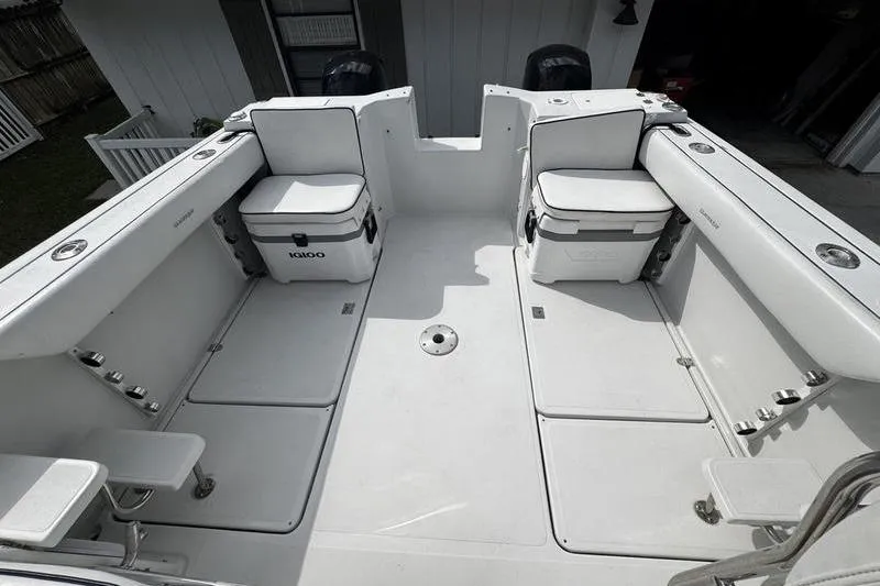 Slide: The Image of 2001 Glacier Bay 260 Canyon Runner boat interior with seating and storage. - 47