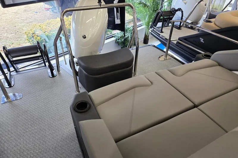 Slide: The Image of 2026 Evotti 521CS boat interior with seating, cup holders, and modern design elements. - 19