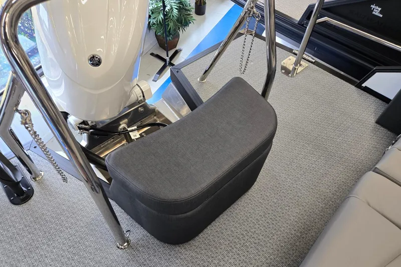 Slide: The Image of Evotti 521CS 2026 boat interior with cushioned seat and metallic railings. - 26