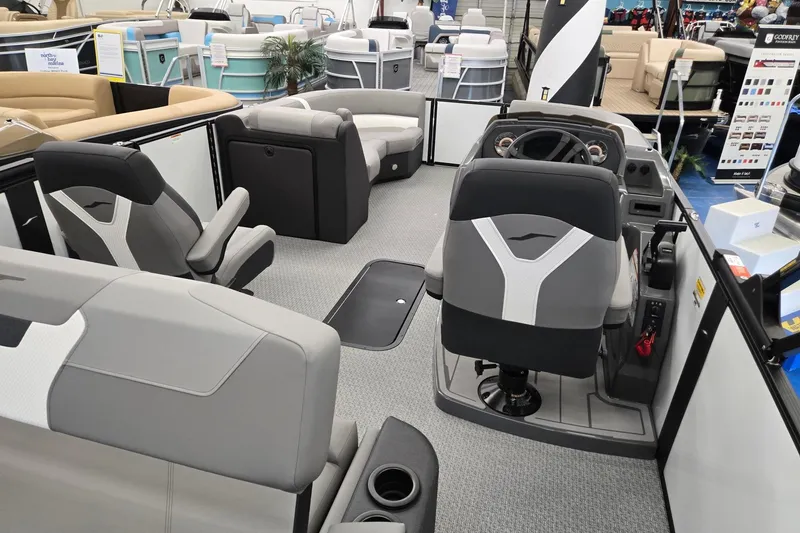 Slide: The Image of Interior of 2026 Evotti 521CS boat with modern seating and steering console. - 29