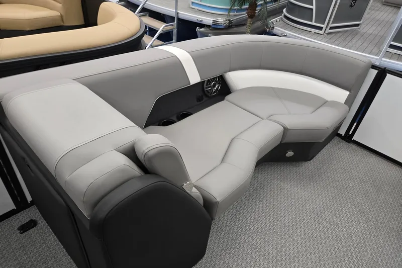 Slide: The Image of Luxurious seating on 2026 Evotti 521CS boat, featuring modern gray and white upholstery. - 33