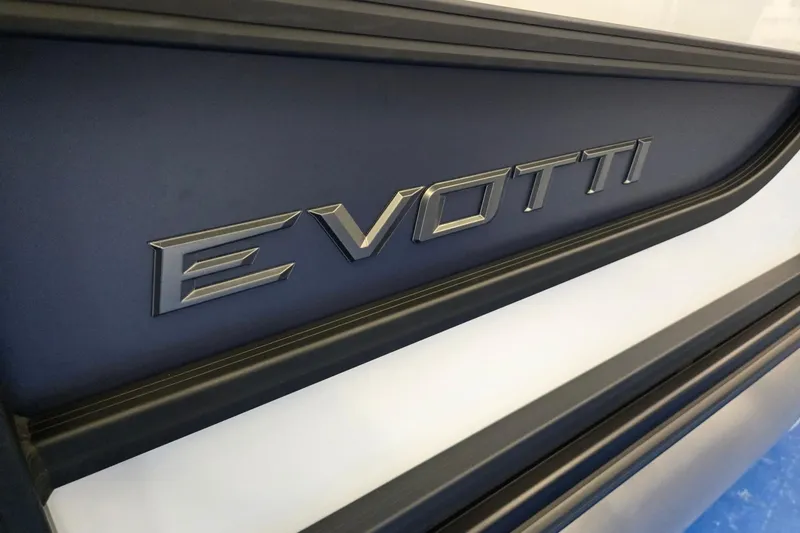 Slide: The Image of Evotti 521CS 2026 model logo on sleek vehicle exterior. - 36