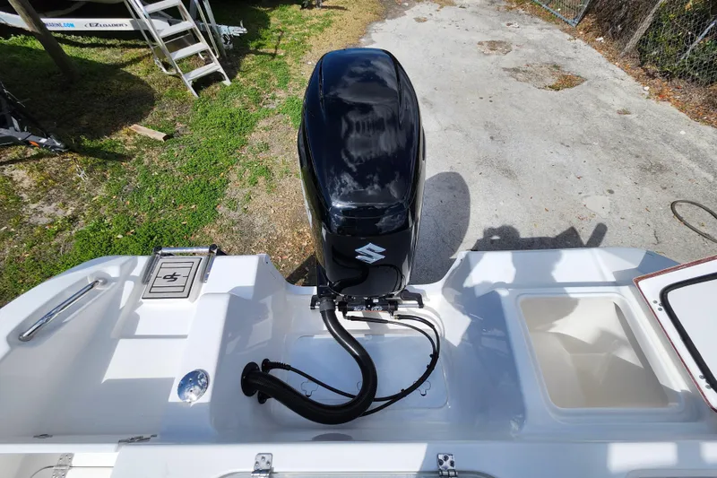 Slide: The Image of 2022 Sea Pro 259 Deep V CC boat with Suzuki outboard motor, viewed from above. - 32
