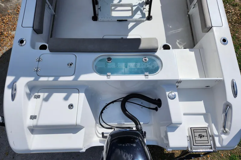 Slide: The Image of 2022 Sea Pro 259 Deep V CC boat deck with storage compartments and seating. - 38