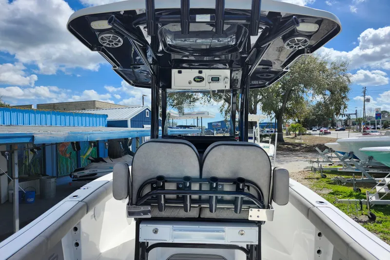 Slide: The Image of 2022 Sea Pro 259 Deep V CC boat interior with seating and overhead console. - 40