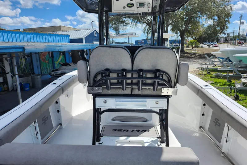 Slide: The Image of 2022 Sea Pro 259 Deep V CC boat interior with seating and console. - 41