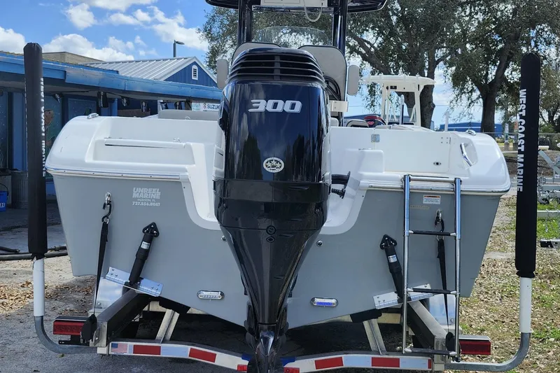 Slide: The Image of 2022 Sea Pro 259 Deep V CC boat with powerful 300 engine on trailer. - 5