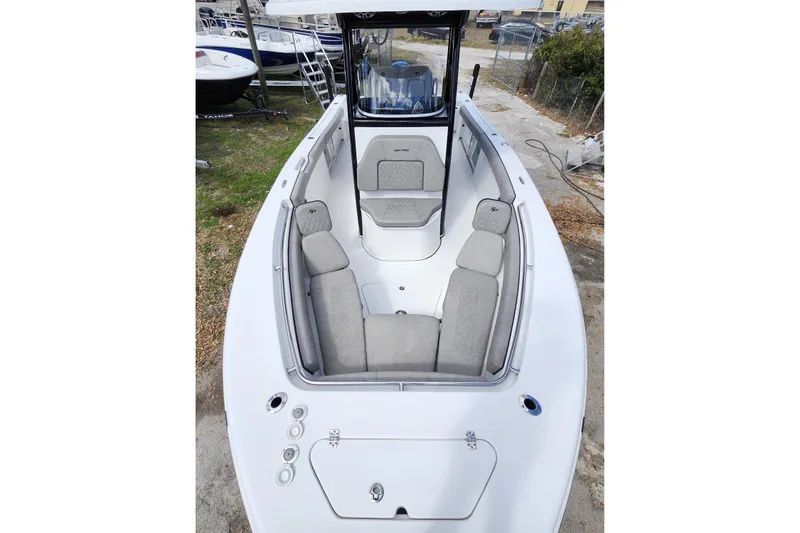 Slide: The Image of 2022 Sea Pro 259 Deep V CC boat with spacious seating and sleek design. - 8