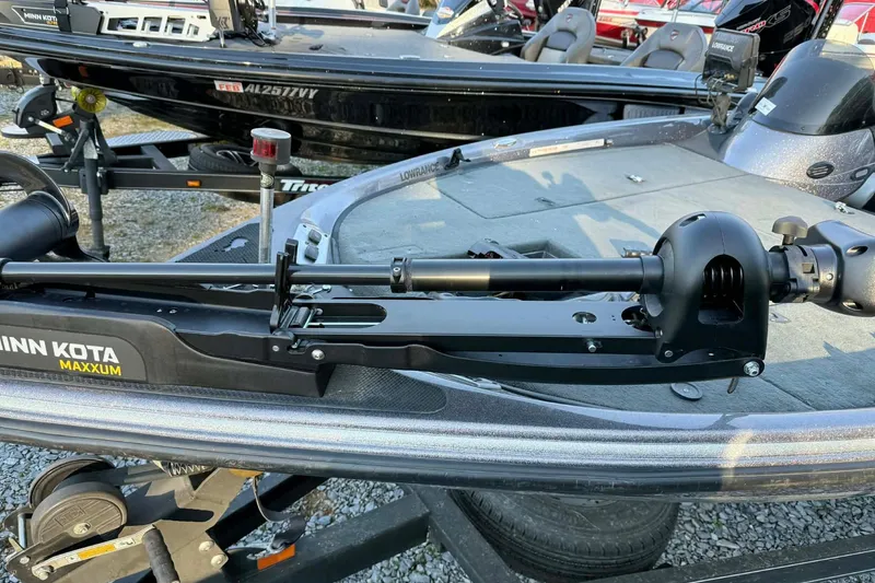 Slide: The Image of 2008 Stratos 294 XL boat with Minn Kota Maxxum trolling motor on deck. - 3