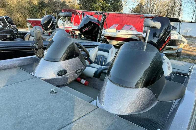 Slide: The Image of 2008 Stratos 294 XL boat with dual consoles and Yamaha outboard motor. - 7