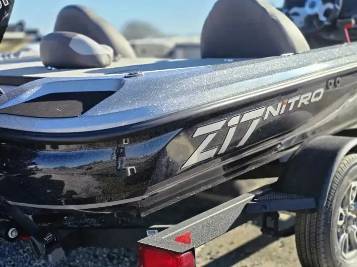 Slide: The Image of 2026 Nitro Z17 boat on trailer, close-up view. - 12