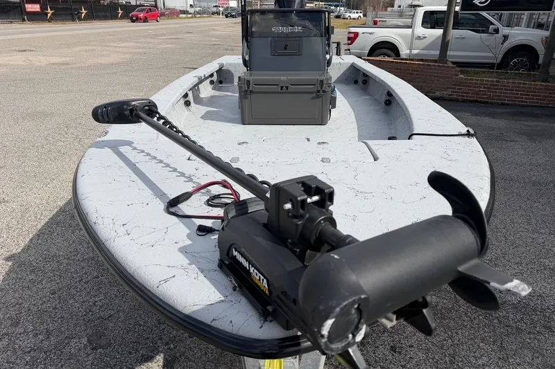 Slide: The Image of 2025 Haynie 23 Magnum boat with Minn Kota trolling motor on deck. - 6