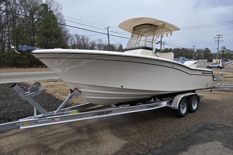 The Image of 2026 Grady-White Fisherman 236 boat on trailer, parked outdoors. - 1