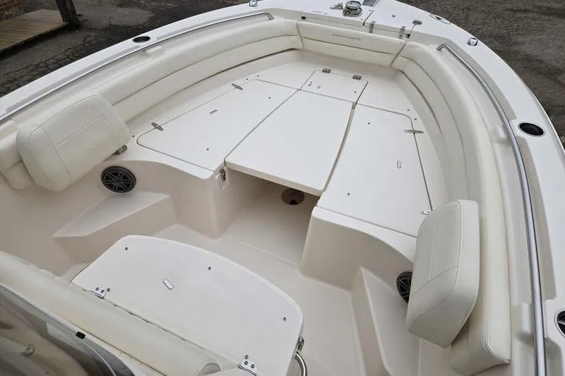 Slide: The Image of 2026 Grady-White Fisherman 236 boat interior with spacious seating and storage compartments. - 22