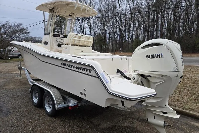 Slide: The Image of 2026 Grady-White Fisherman 236 boat with Yamaha engine on trailer. - 4