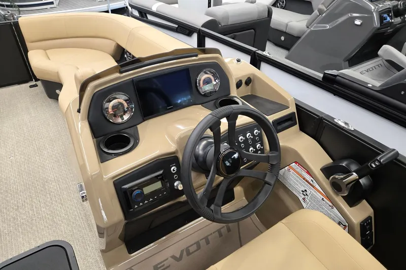 Slide: The Image of Interior of 2026 Evotti 521QL boat with modern dashboard and steering wheel. - 10