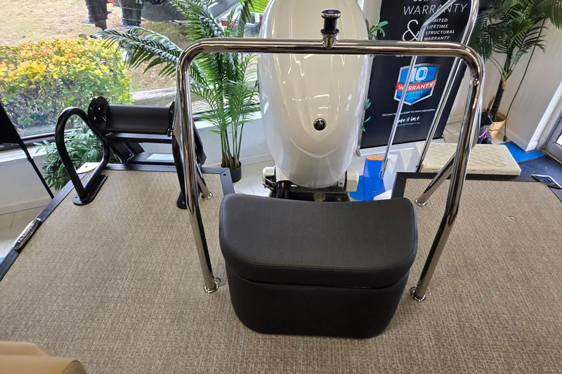 Slide: The Image of 2026 Evotti 521QL boat interior with seating and railing, showcasing warranty signage. - 18